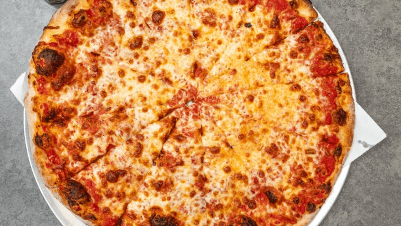 Apizza Grande's pepperoni and sausage pizza